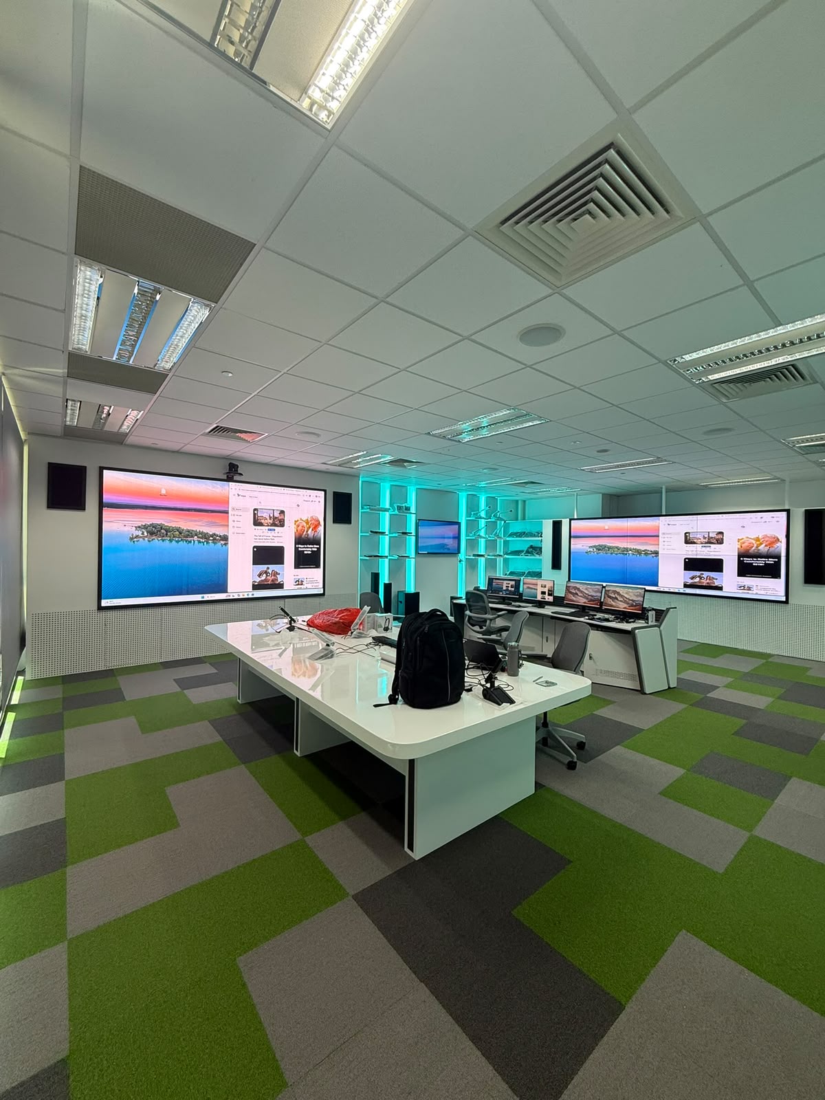M3 Assets office and showroom with screens and work tables