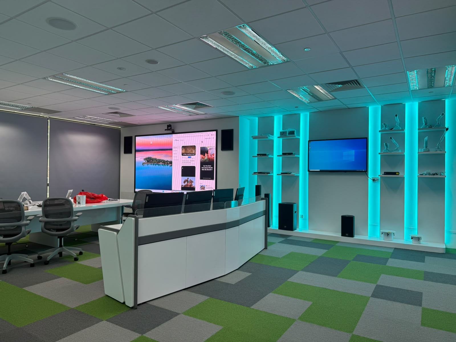 M3 Assets showroom with curved counter and illuminated display features